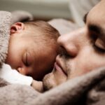 Napping - Close up of a Dad and his Little Baby Sleeping Together