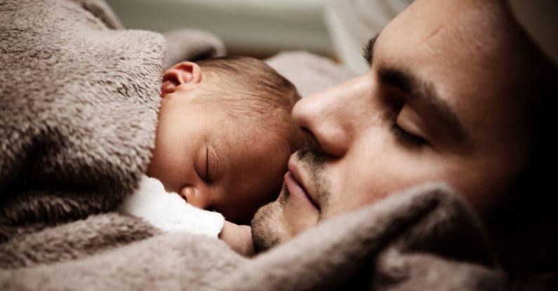 Napping - Close up of a Dad and his Little Baby Sleeping Together