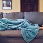 Napping - Person Lying on Sofa