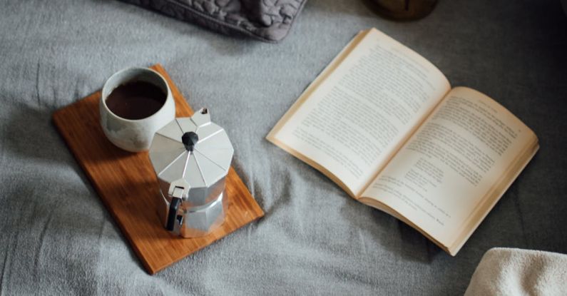 Bedtime - Coffee with book on cozy bed