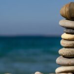 Relaxation - Cairn Stones and Body of Water in Distance