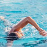 Techniques - A Person Doing a Freestyle Swimming in the Pool