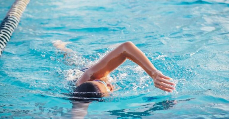 Techniques - A Person Doing a Freestyle Swimming in the Pool