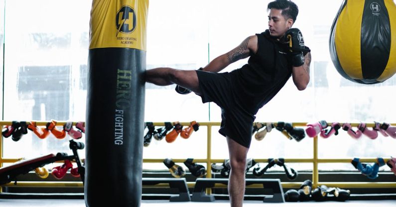 Techniques - Boxer practicing attack in gym