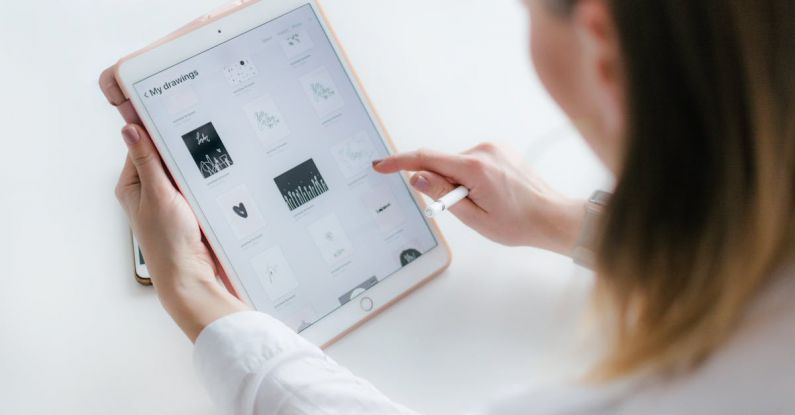 Apps - Woman Sitting Beside Table While Using Ipad